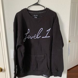 Men’s black crew neck. Level 1